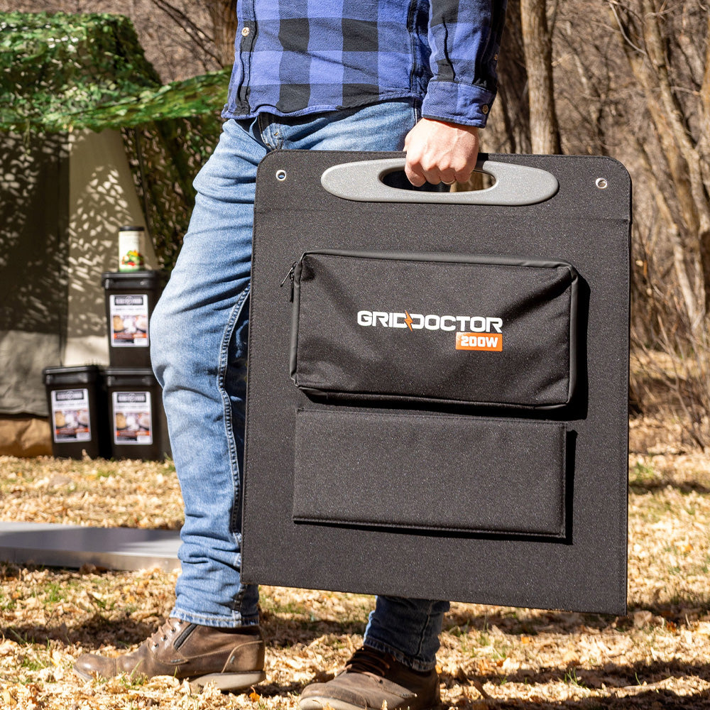 Man holding 200W Solar Panel