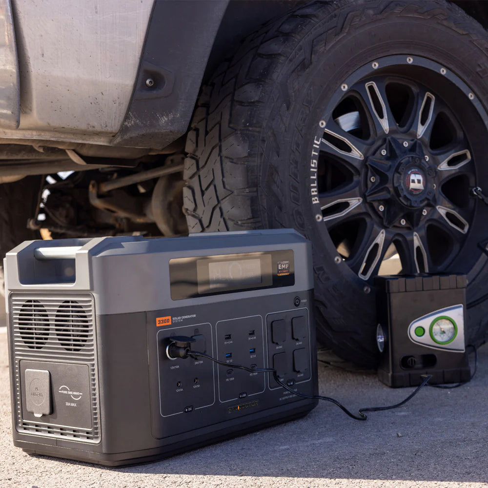 Grid Doctor 3300 EMP being used to inflate a truck tire.