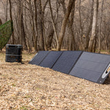 Grid Doctor 3300 EMP with Free 200W Solar Panel set up outdoors with the expansion battery.