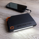 65W Power Bank connected to a phone