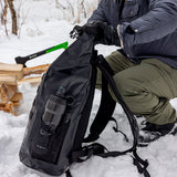 Person packing waterproof backpack in winter