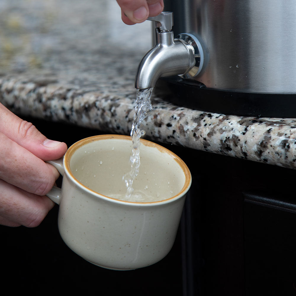 Alexapure Pro filling a coffee mug.