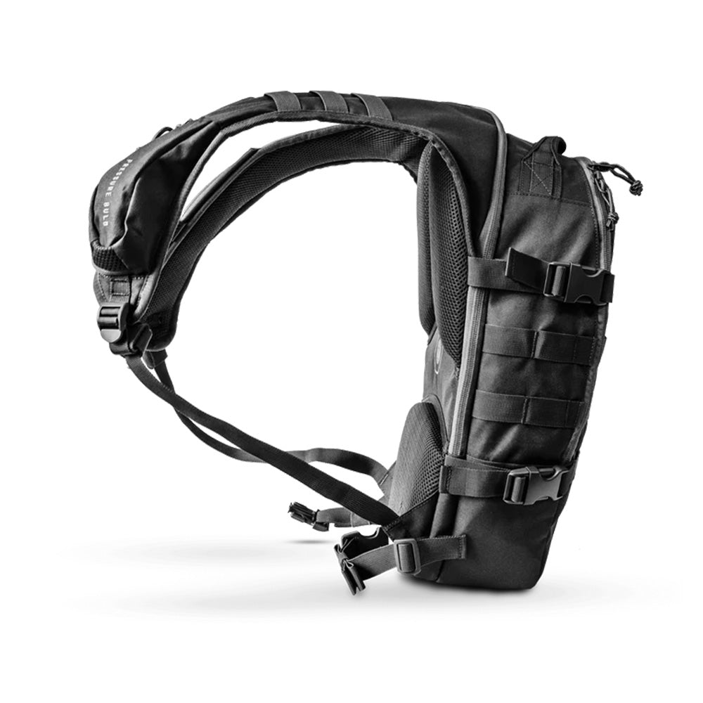 Side view of Aquamira RIG 700 tactical hydration pack with adjustable straps and MOLLE webbing