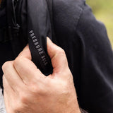 Close-up of Aquamira RIG 700 shoulder strap and pressure bulb for the pressurized hydration system