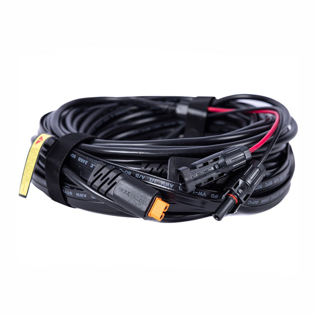 Coiled black cable with connectors on a white background