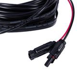 Coiled black cable with red and black connectors